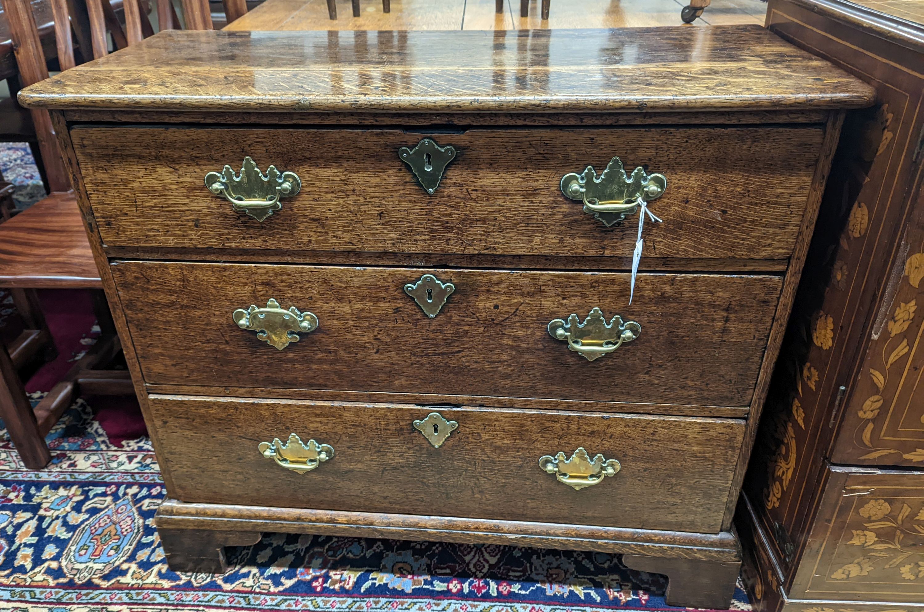 An 18th century oak three drawer chest, width 92cm, depth 39cm, height 80cm